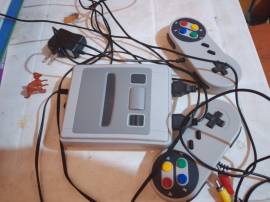 Super Nintendo console for sale with its two levers, USD 150.00